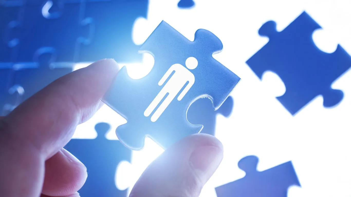 Human resource puzzle piece with person icon